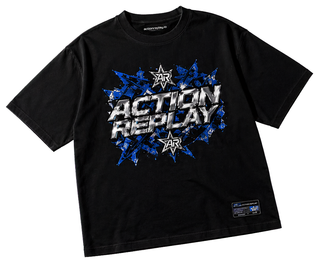Transparent cutout of a black Action Replay graphic T-shirt with chrome and blue artwork.